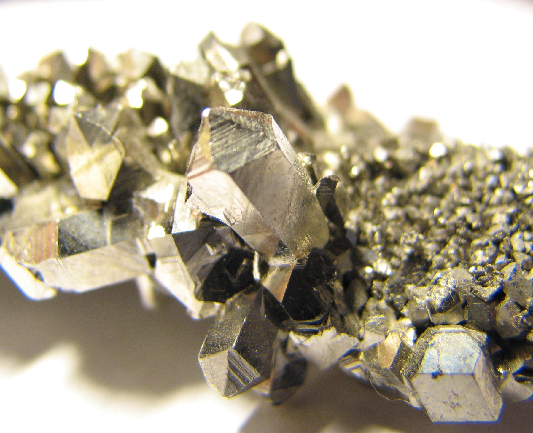 Close-up photograph of reflective niobium crystals.